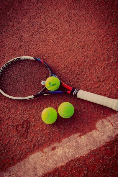 Equipamento de esporte de raquete